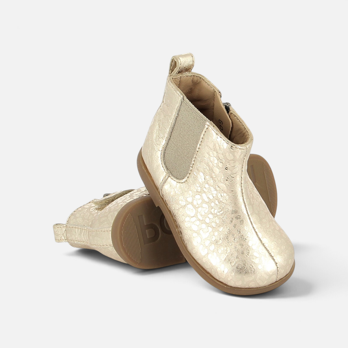 Bottines premiers-pas Pom d'Api dorées à motif texturé avec fermeture éclair latérale et élastique pour bébé