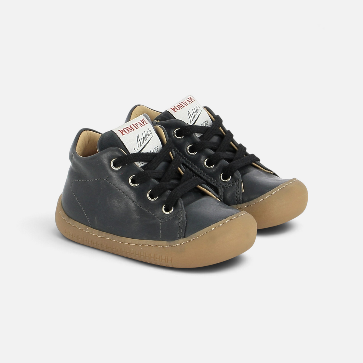Chaussures barefoot Pom d'Api Yaka Walk noires en cuir souple avec semelle gomme naturelle pour premiers pas