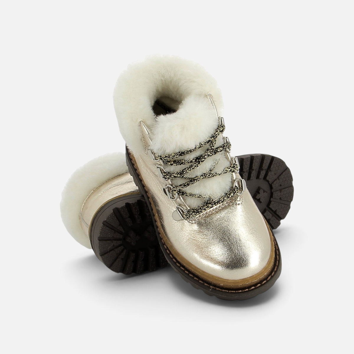 Bottines de montagne Pom d'Api dorées en cuir lisse avec doublure en fausse fourrure blanche et semelle crantée