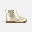 Bottines premiers pas Pom d'Api dorées à motif texturé avec élastique latéral et fermeture zippée pour enfant