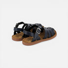Pom d'Api dark blue leather gladiator sandals with buckle closure and cushioned insole for comfort.