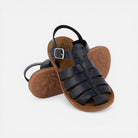 Pom d'Api dark blue leather gladiator sandals with buckle strap and memory foam insole.