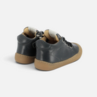 Chaussures barefoot Pom d'Api YAKA noires en cuir souple avec semelle plate et flexible pour les premiers pas