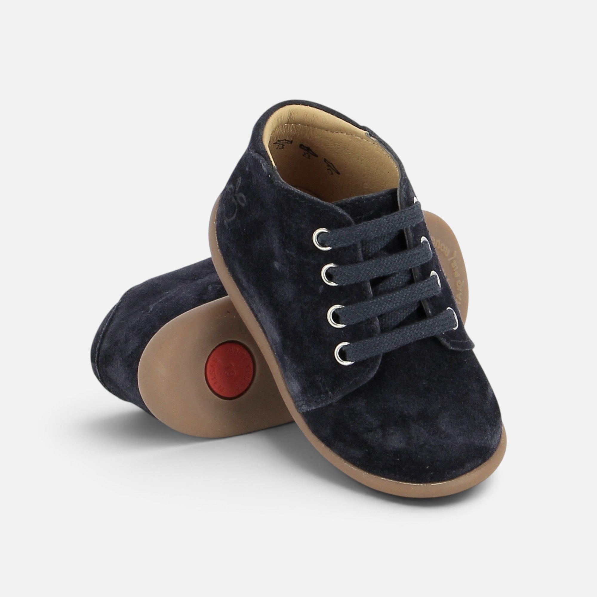 Bottines premiers pas Pom d'Api en velours bleu nuit avec semelle souple et système anti-torsion