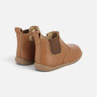 Bottines premiers pas Pom d'Api Buda en cuir marron avec élastique latéral et semelle souple anti-torsion