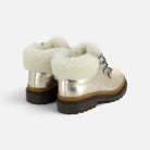 Bottines Pom d'Api Wall Mountain en cuir doré laminé avec col en fausse fourrure blanche et semelle crantée marron
