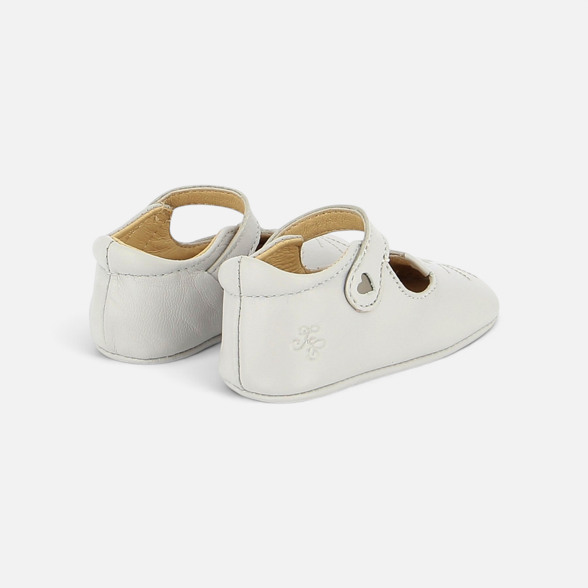 Chaussons bébé Pom d'Api en cuir souple blanc avec bride élastiquée et détail cœur, vue arrière
