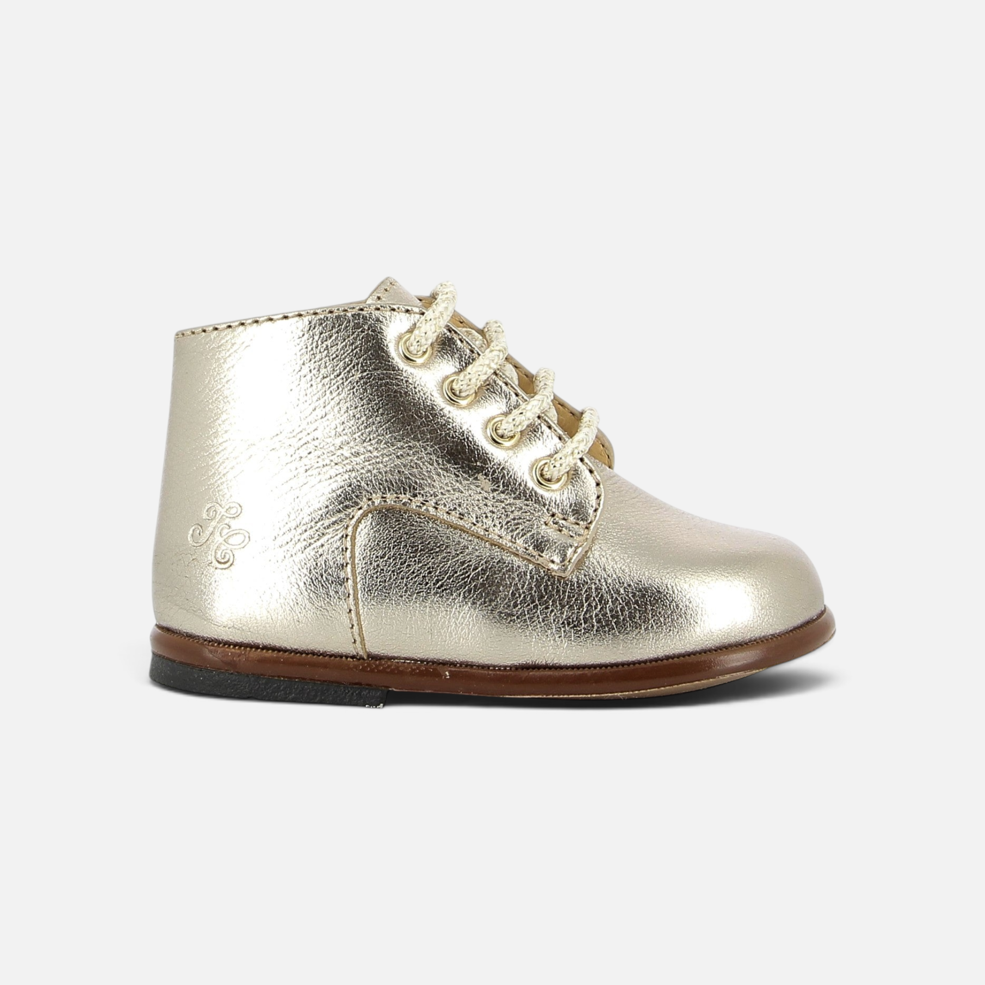 Chaussure premiers pas Pom d'Api en cuir doré avec lacets, bout rond renforcé et semelle antidérapante